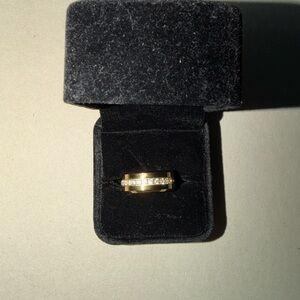 Elegant Gold Band with Sparkling Accents